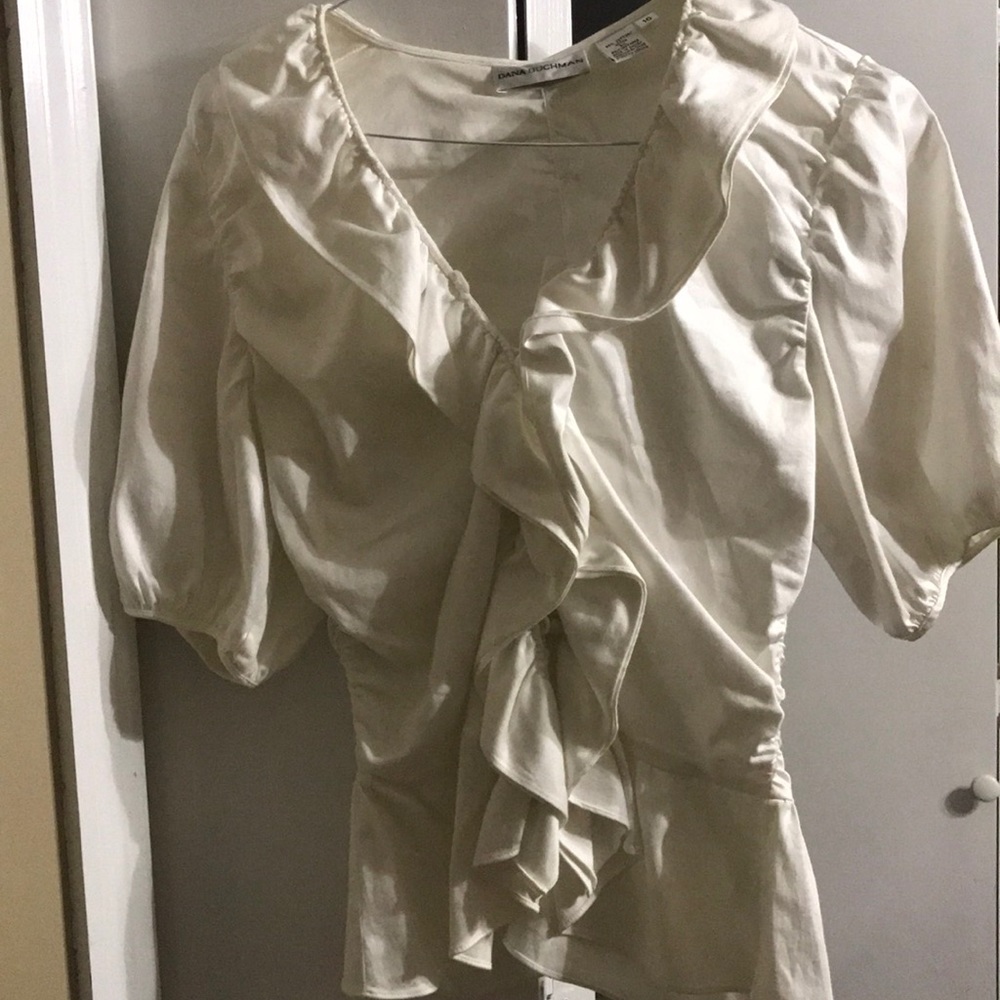 White ruffled top